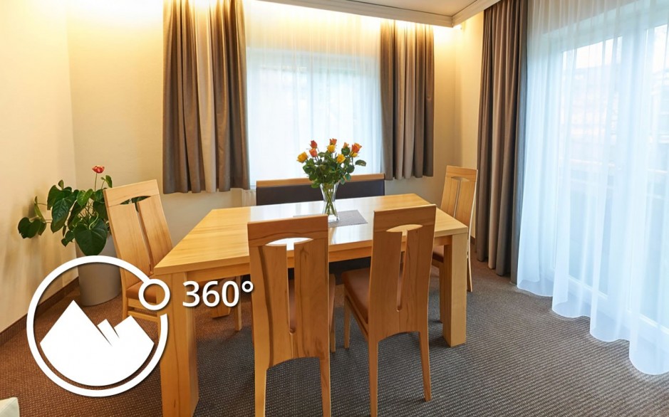 area with table in Superior Appartement A in the Apartmenthotel Panorama