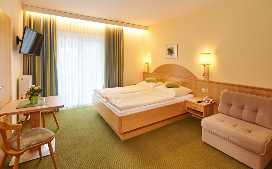 Bedroom with cozy and bright furnishing in Apartment Panorama in Wagrain